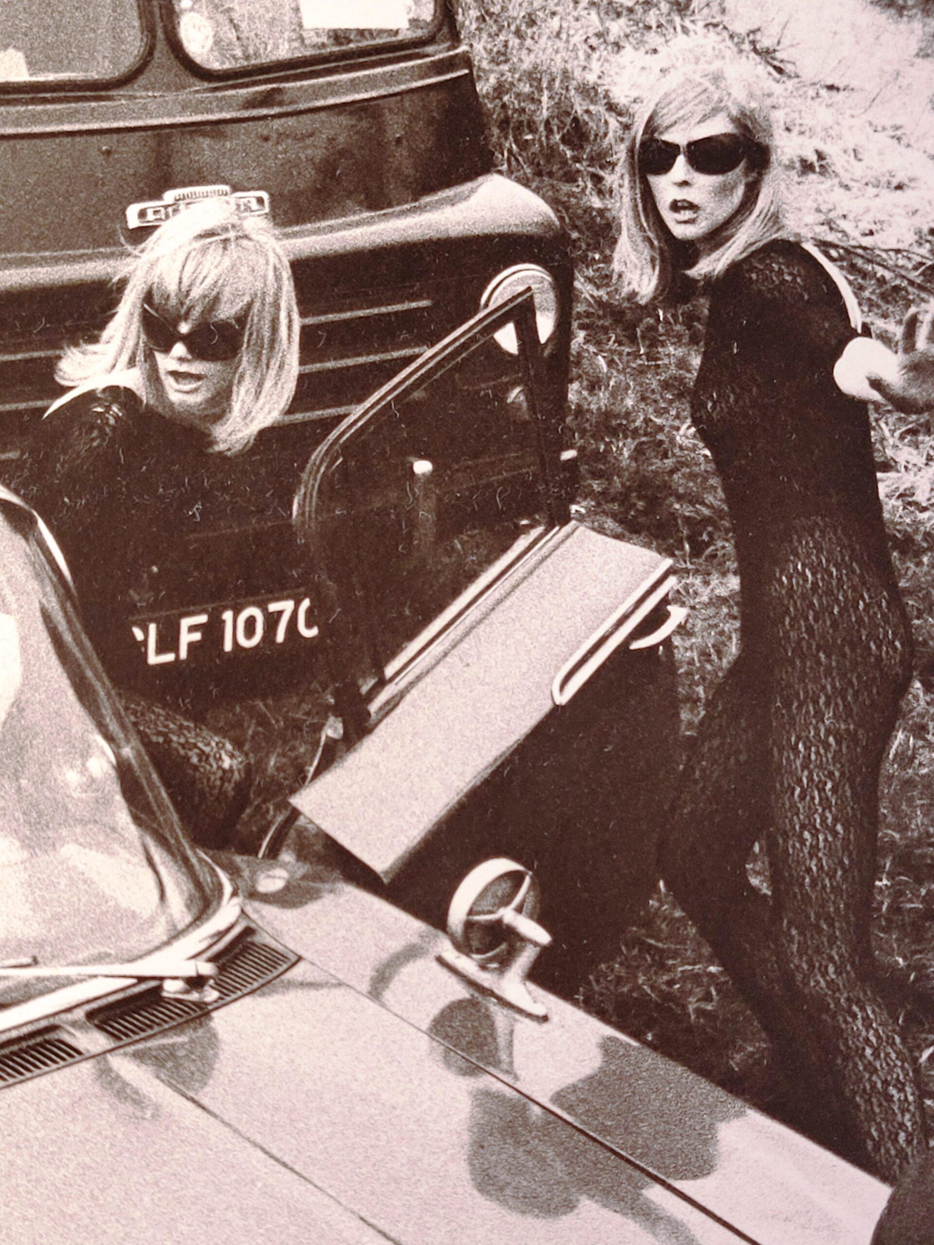 Acrilan sixties country road-block, rebellious sunglass-bearing gals and vehicles, by Michael Joseph