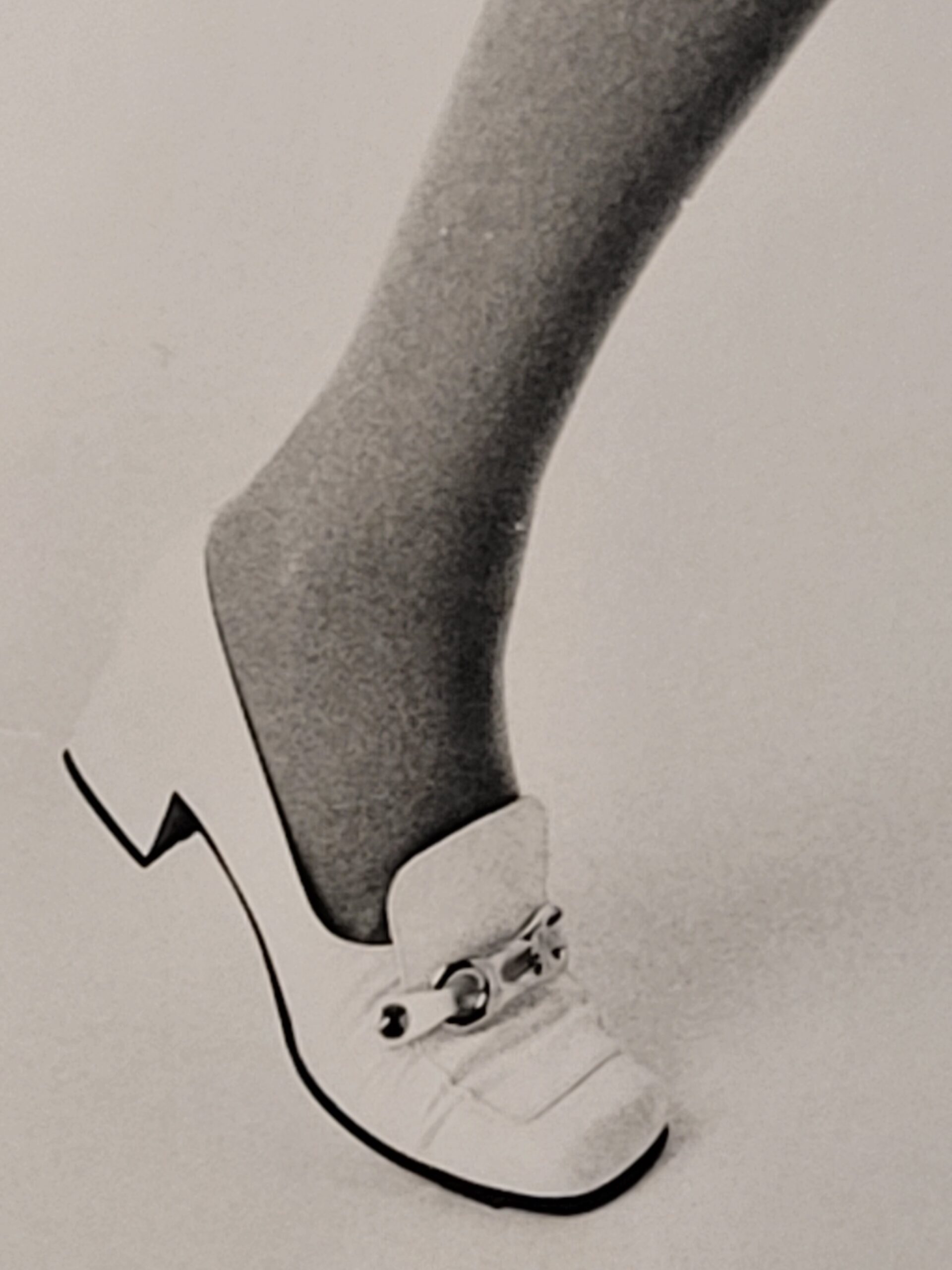 Pretty blonde model holding her glasses with her teeth, say oh really - only by Michael Joseph